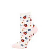 White sock with colorful ladybug and flower pattern on a white background